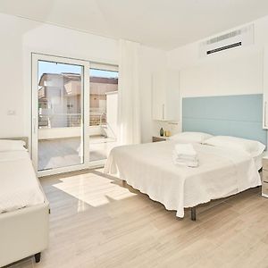 Camera quadrupla superior in edificio annesso